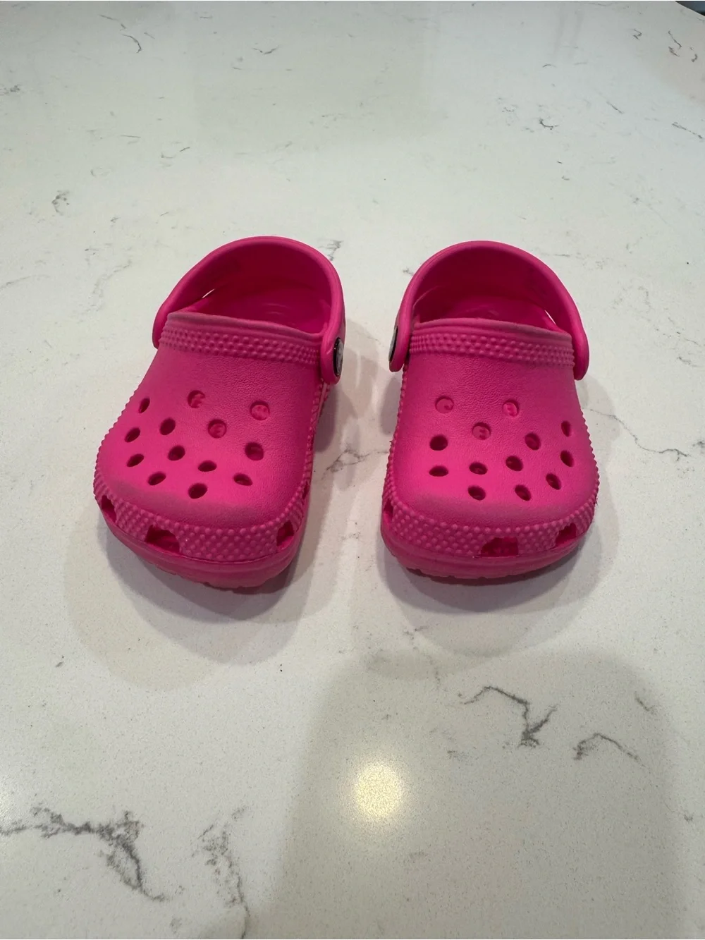 Pink toddler Crocs Classic Clogs in the 
